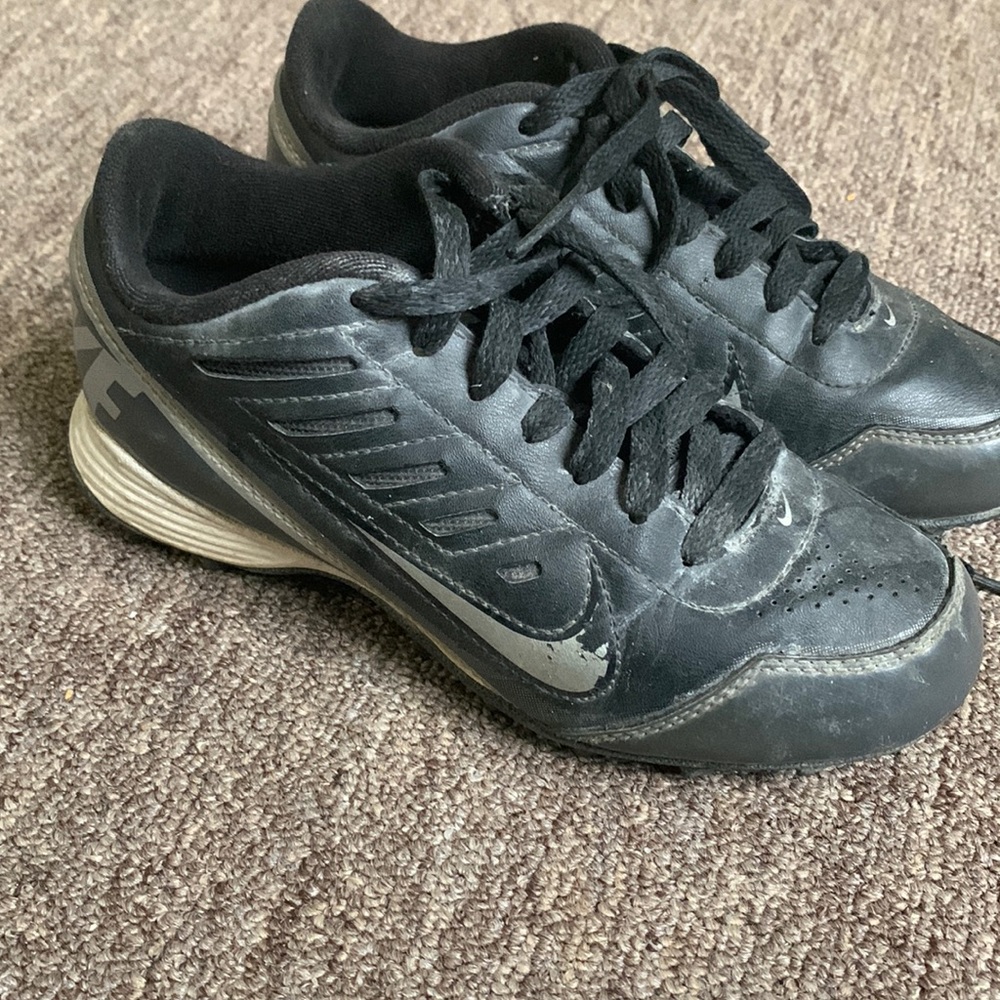 Well loved size 2 Nike cleats. A lot of life left
